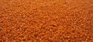 Quarzo colorato arancione [0,7-1,2 mm]